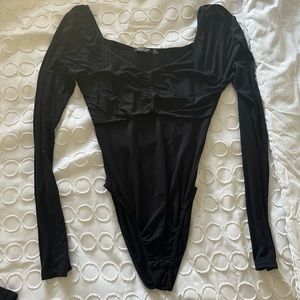Stretchy black bodysuit used once